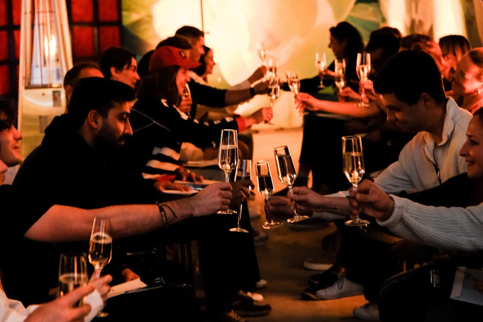 Audience celebrating with prosecco